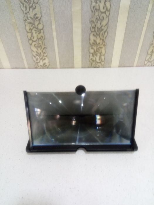 Экранни катталаштирувчи 14 дюмли 3D экран.