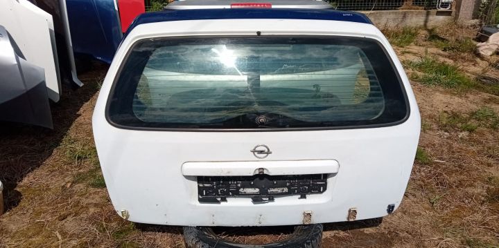 Haion  Mici zgarieturi fara anexe Opel Astra G seria