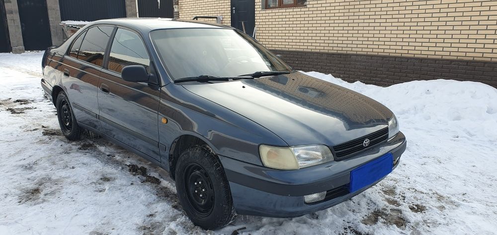 Продам машину тойота карина е