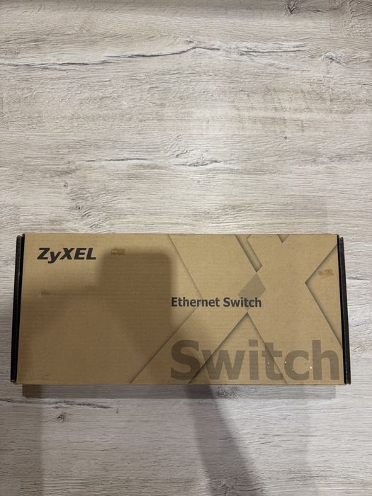 24-портов суитч ZyXEL