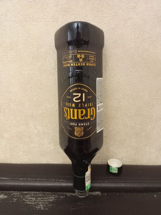 Стеклянная бутылка