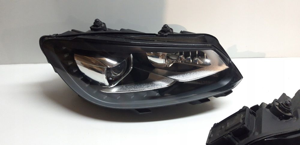 Vw Touran Caddy 1T far xenon led bixenon stanga dreapta faruri modul