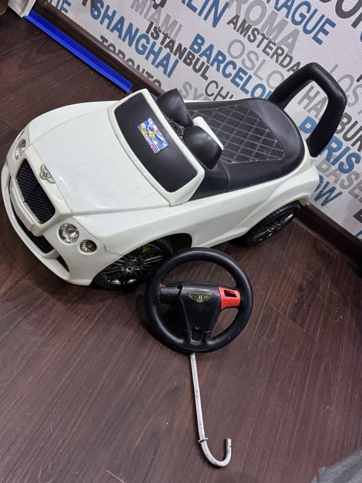 Машинка с рулём детская