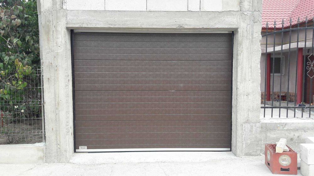 Usa de garaj sectionala izolata 2500/2000 standard pret 591 euro