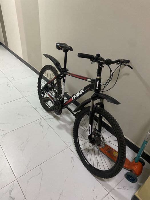 Велосипед trinx.