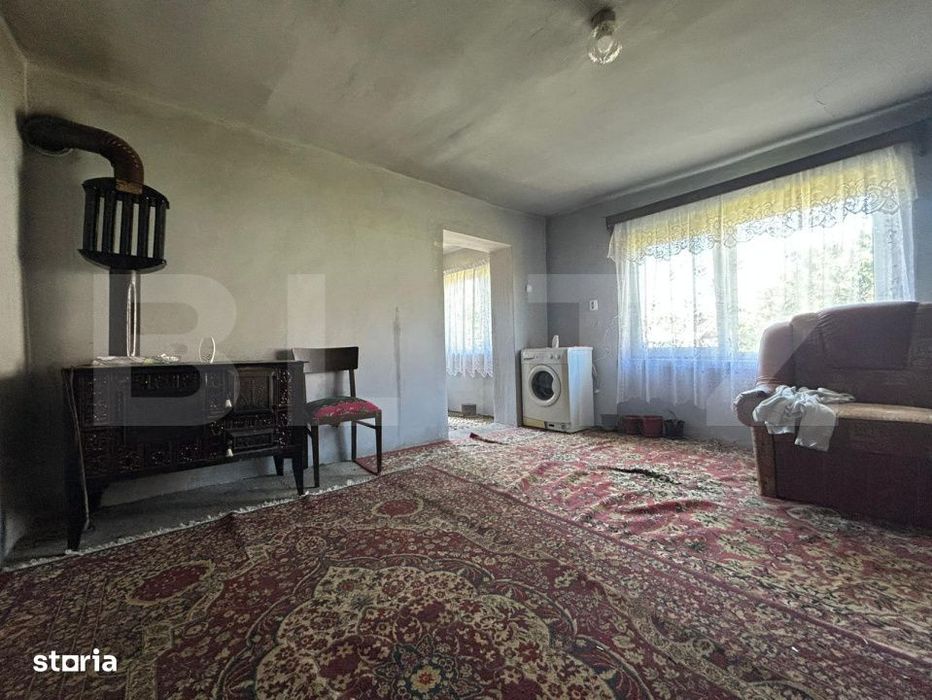 Casa cu teren generos de 1100 mp in Comuna Mica – ideala pentru inve