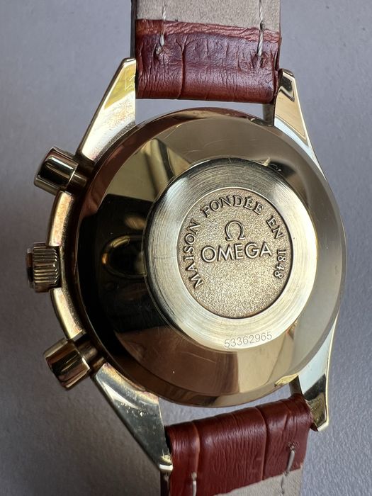 18 k aur Omega Speedmaster Moonphase,Triple Date ref. 175.0034 cal.1150