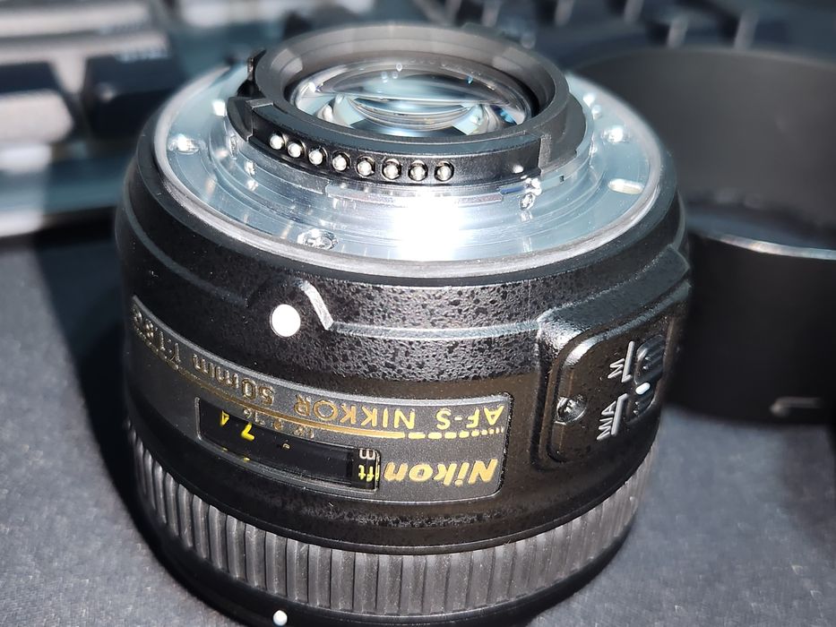 Nikon 50 mm f1.8 Nikkor 50 mm F1.8 като нов