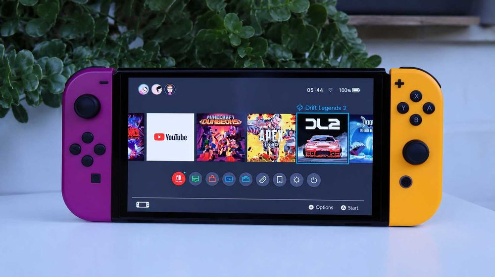 Nintendo Switch OLED – пълен комплект + 2 чифта оригинални Joy-Con + NYXI Hyperion Pro