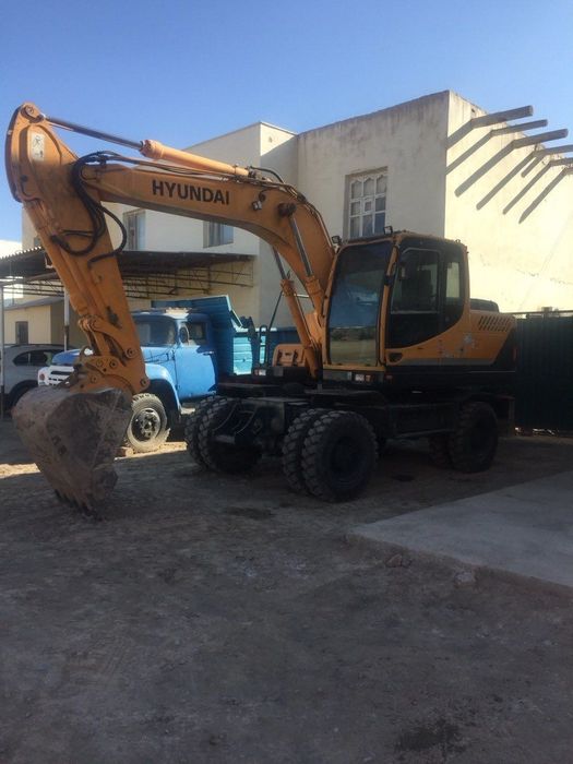 Ekskavator Hyundai 140 W. Экскаватор Хундай 140