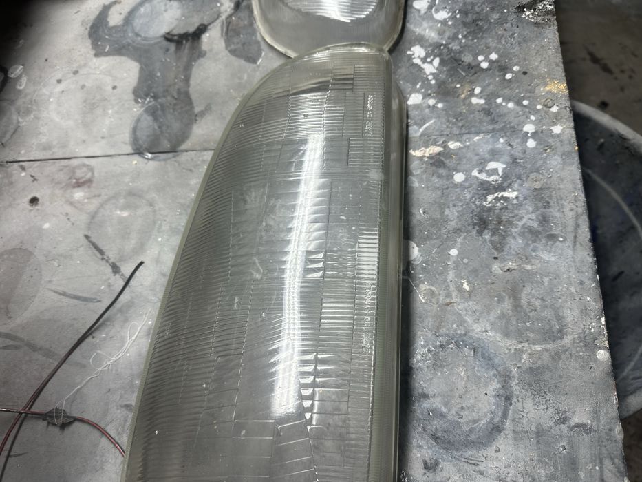 Делика фары оригинал стекло