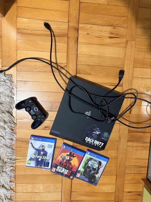 ps 4 pro + controller , Red Dead redeption, Fifa23,Cod Mw