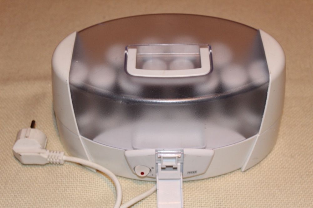 Уред за подгряване на йонизиращи ролки за къдрене на коса TCM