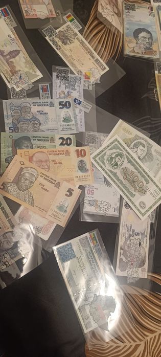 Lot 100 de bancnote din 50 de țări în folii