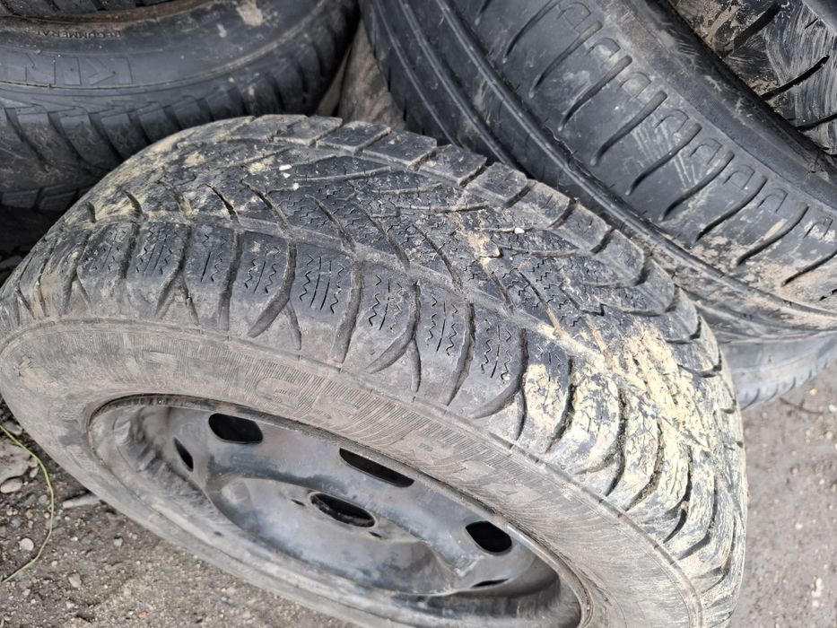 Vand 1 roata R 14 opel cu anvelopa 175 65 14 buna m+s