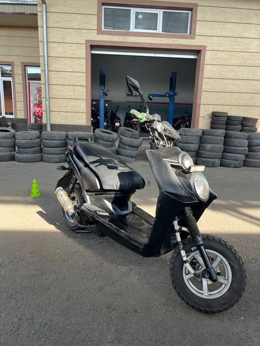 Irbis skutr Rangi qora matvi