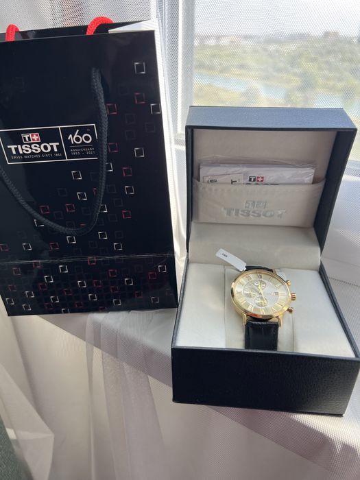 Золотые часы 750 пробы