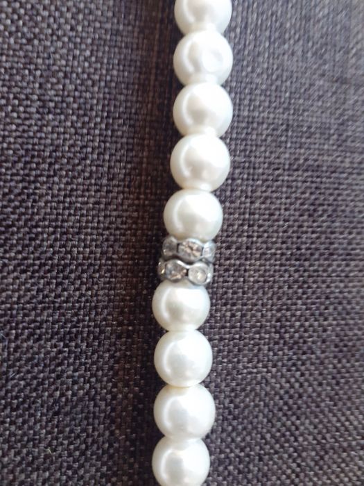 Перлена огърлица