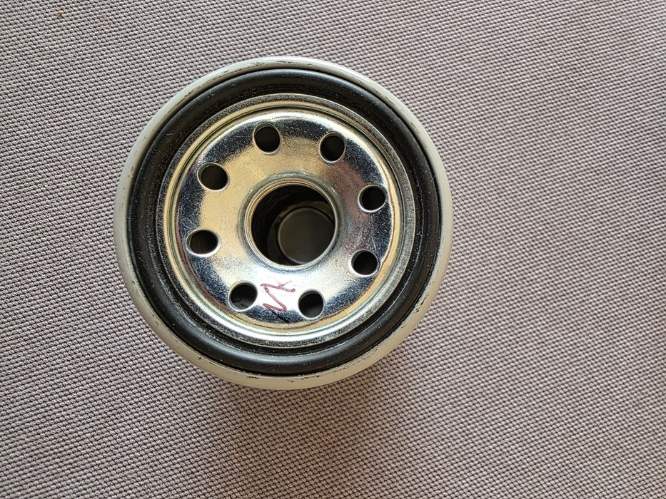 ПРОМОЦИЯ - Продавам 4броя Запалителни Свещи и Маслен филтър за Нисан