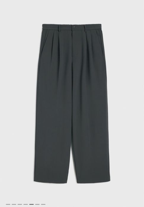 Широкие брюки с защипами