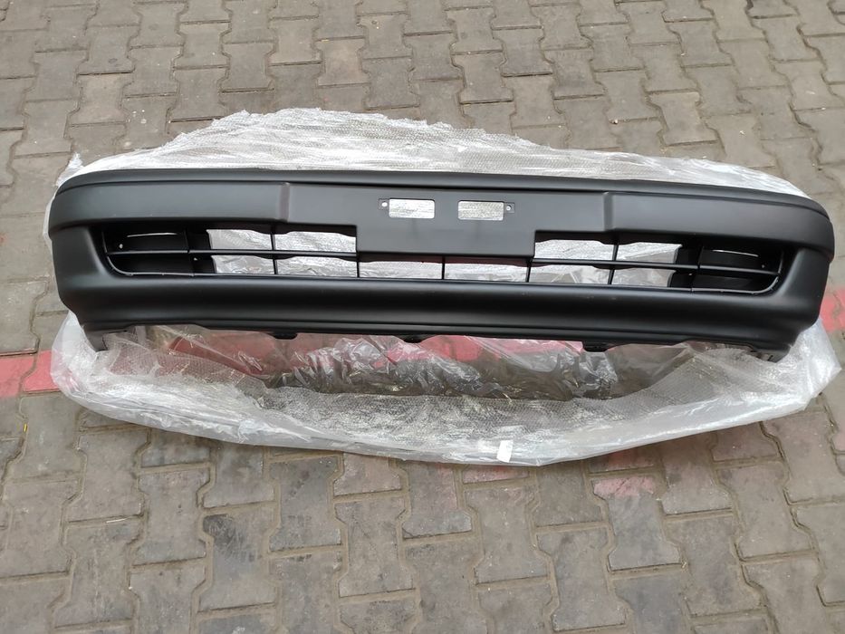 Бампер Карина Е передние