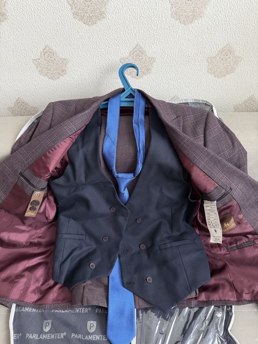 Продам новый костюм б/у