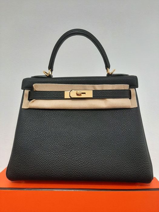 Сумка на ремне и с ручкой