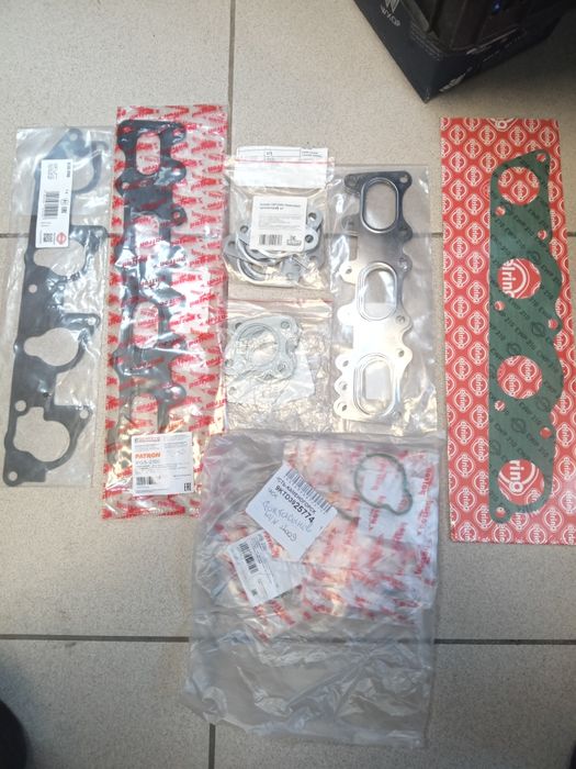 Прокладка впускного и выпускного коллектора на Мерседес М102 М111 М104