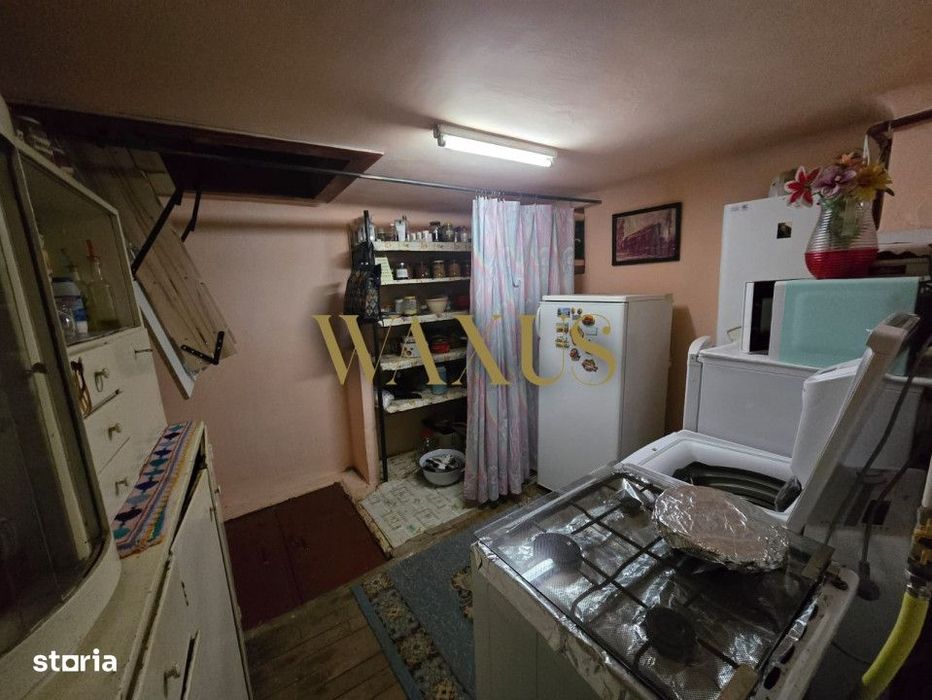 Casa de vanzare cu 2 camere si curte generoasa in zona Gruia