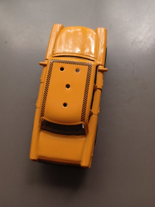 Игрушка такси , желтая