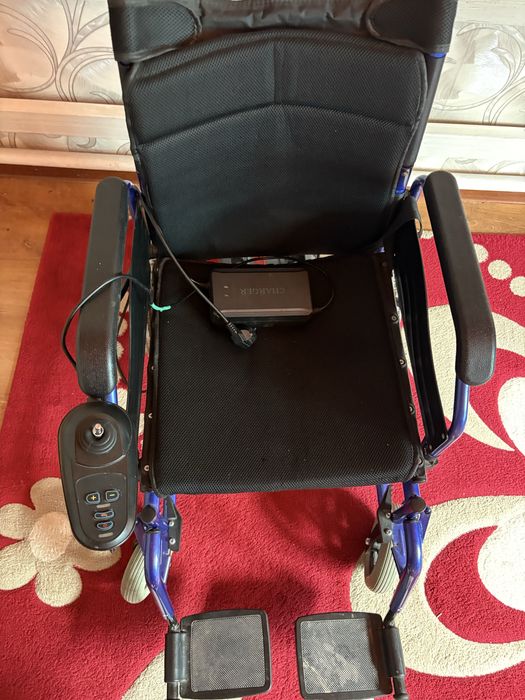 Электрическая инвалидная коляска