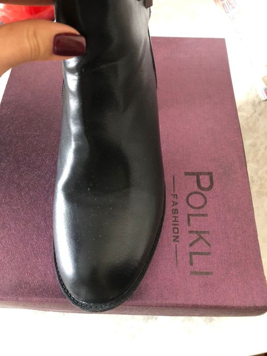 Женские сапоги с высоким голенищем