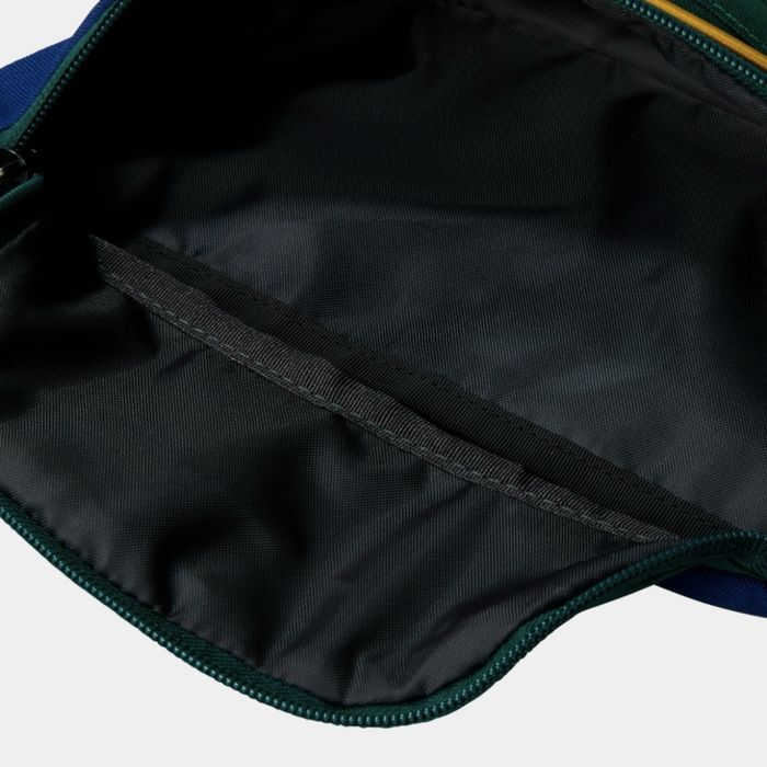 Поясная сумка The North Face.