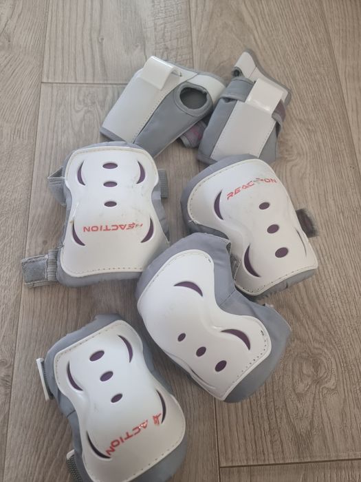 Роликовые коньки