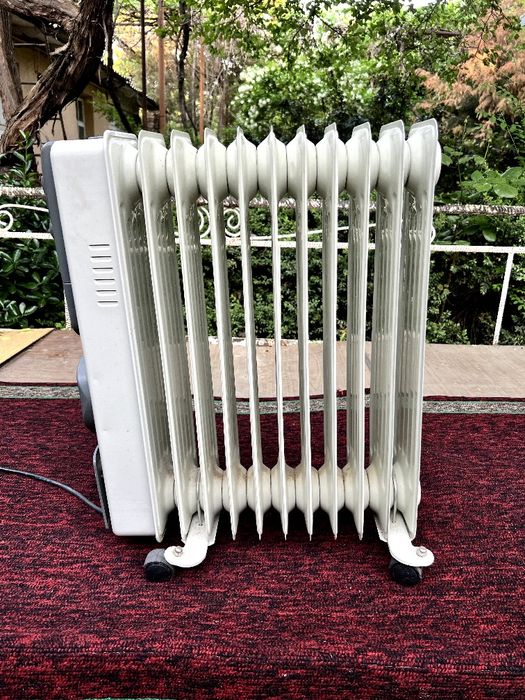 Масленный обогреватель