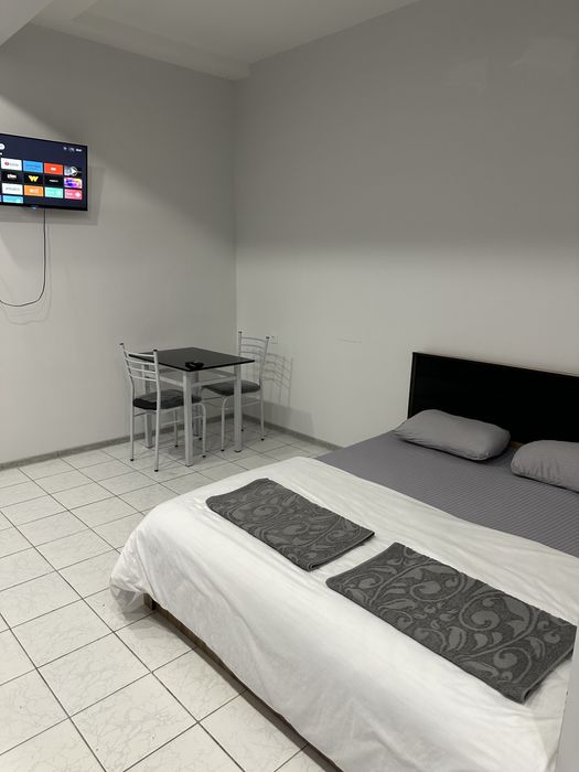 Bez zaks Hotel TJJ mehmonxonasi