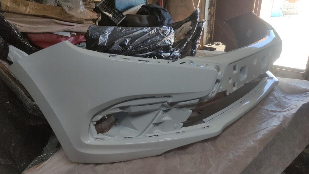Новый передний бампер гранта фл