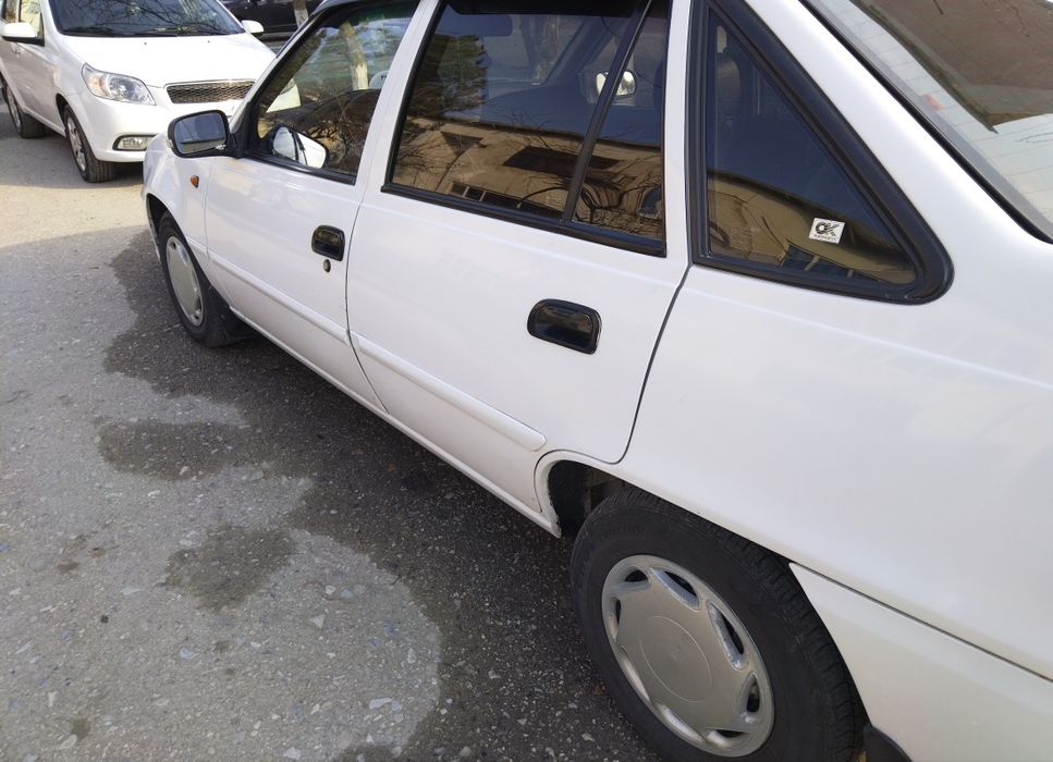 Нексия 2 тулик краскаланган сарикдан ок булган