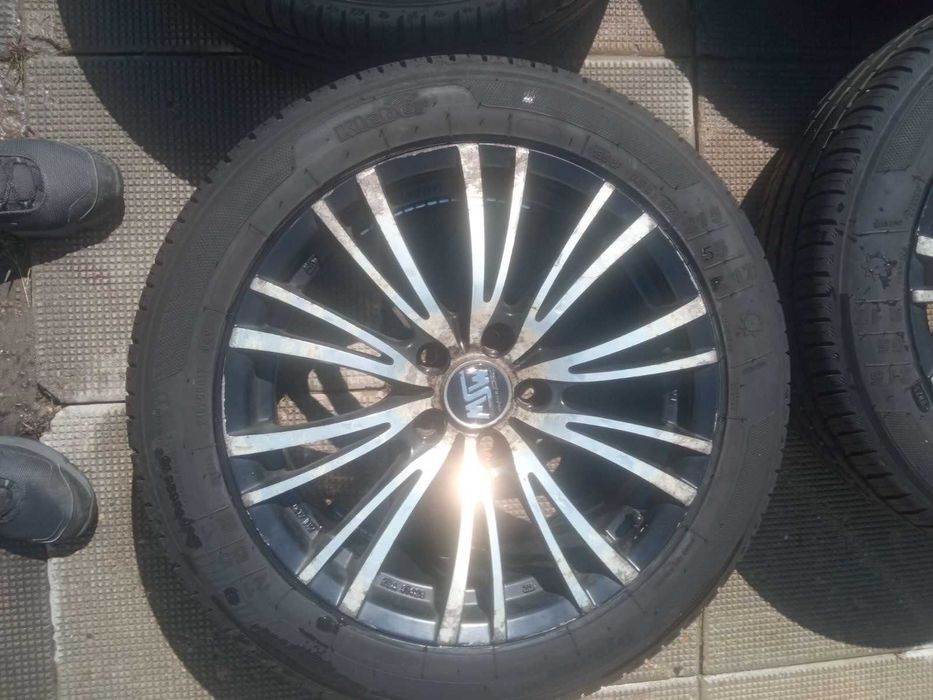 Продавам комплект от 4 бр. летни гуми 215/55/17 с джанти  за OPEL