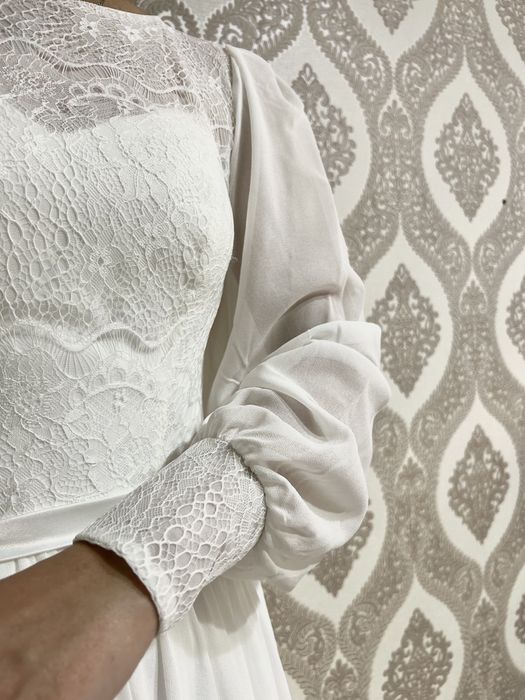 Продам свадебное платье 44р