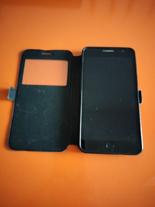 Телефон Alcatel one touch