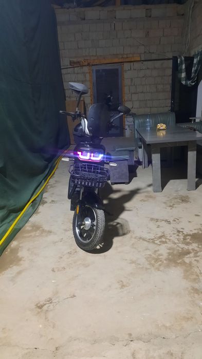 Skuter  qushimchaga zaryatka