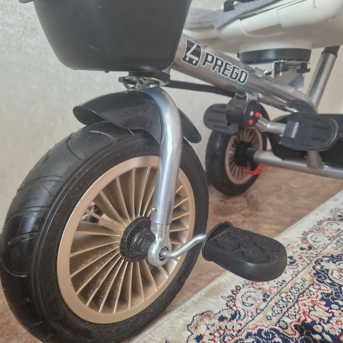 Велосипед трёхколёсный с ручкой