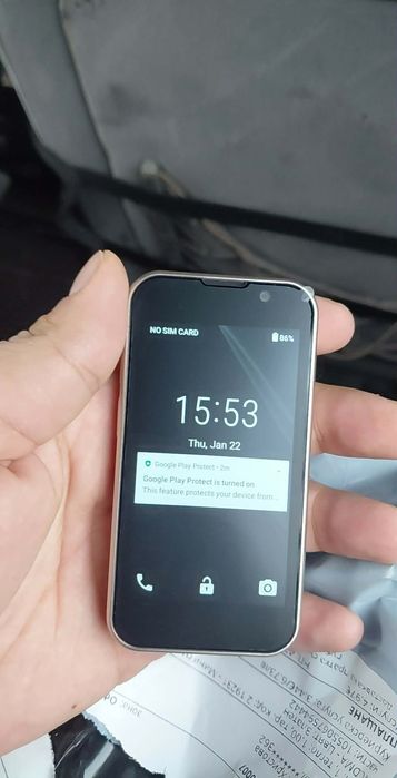 Мини телефон чисто нов