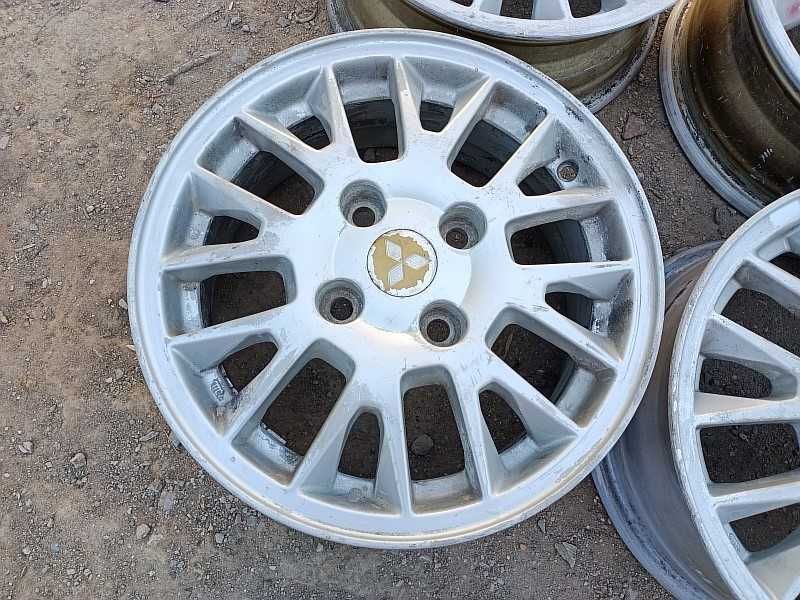 Продам оригинальные легкосплавные диски на Mitsubishi Galant