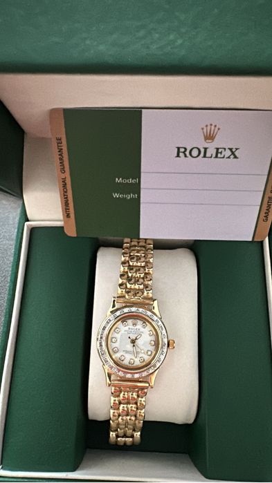 золотые часы Rolex с бриллиантами