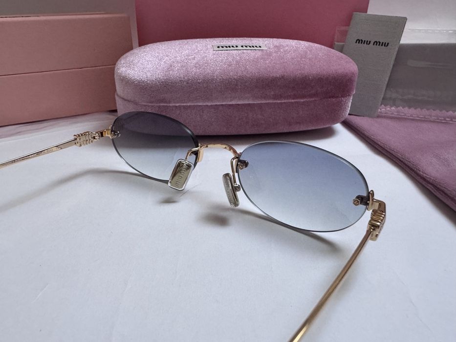 Ochelari de soare Miu Miu Oval-Rimless SMUA54 51-20 140, Noi