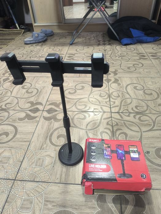 Поставка для телефонов