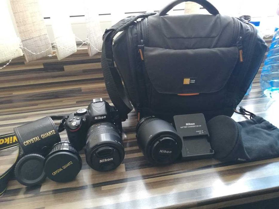 Продавам фотоапарат NIKON D5100 с пълен комплект обективи и аксесоари