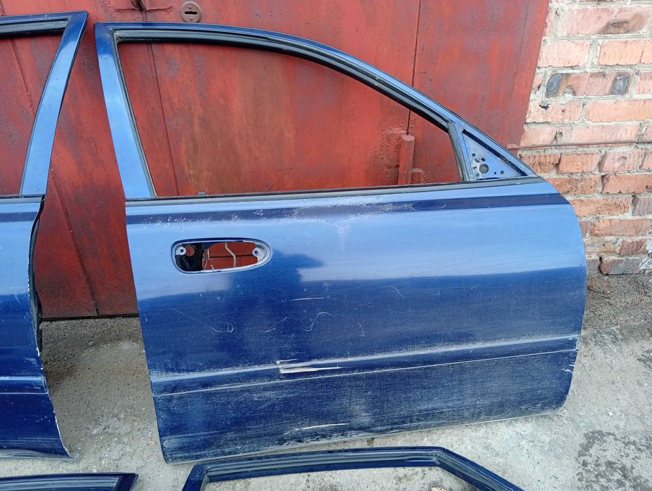 Двери Mazda Cronos Хэтчбек